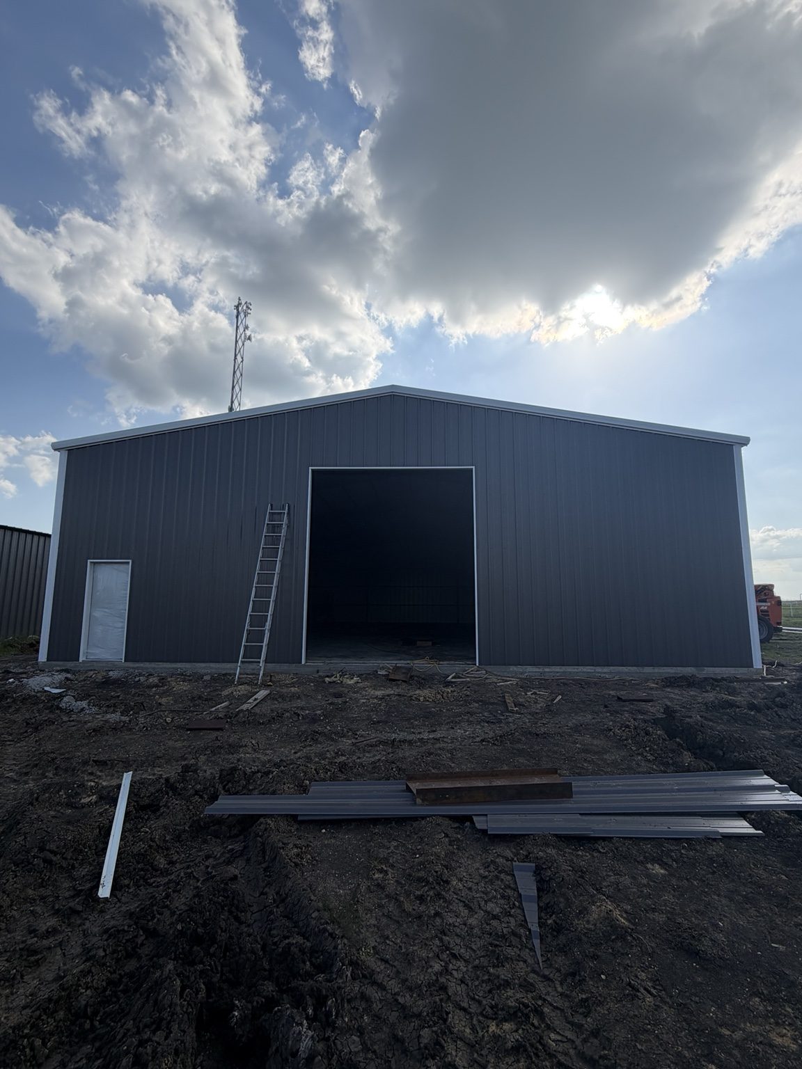 Large gray metal shop building constructed by Double B Builders
